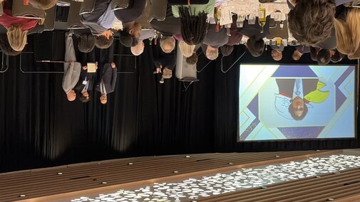 Luke Attard receiving his award on stage at the CUTC dinner.